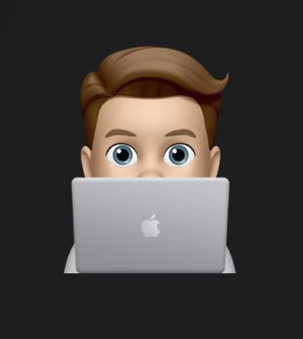 Steven’s Genmoji typing behind a laptop